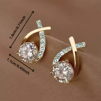 Lilou™ | Boucles d’oreilles clous croix dorée