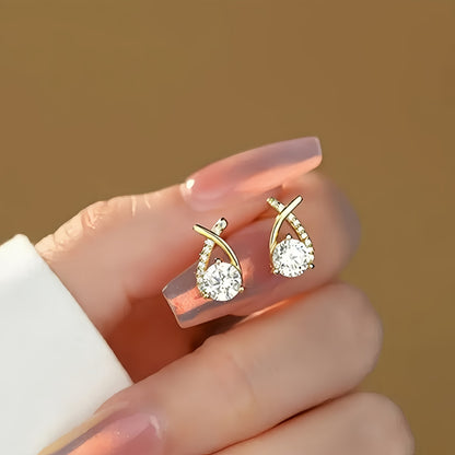 Lilou™ | Boucles d’oreilles clous croix dorée