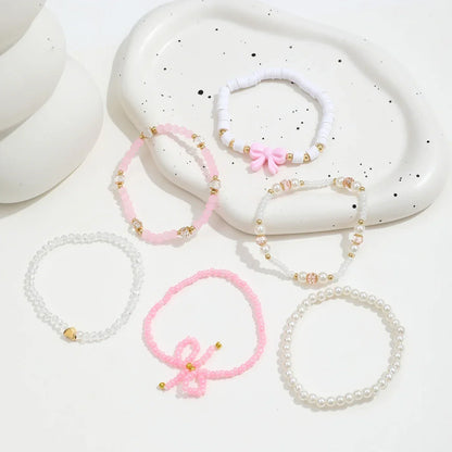 Ottilie™ | Set de bracelets en perles amour et rosette