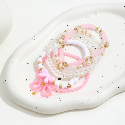 Ottilie™ | Set de bracelets en perles amour et rosette
