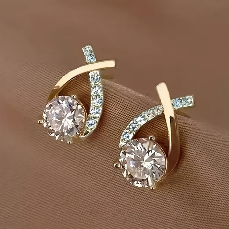 Lilou™ | Boucles d’oreilles clous croix dorée