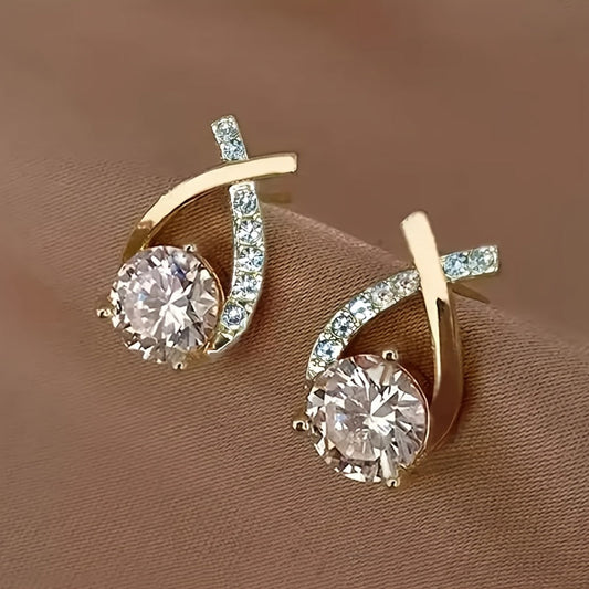 Lilou™ | Boucles d’oreilles clous croix dorée